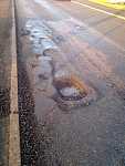 Click image for larger version. 

Name:	dangerous-pothole-small.jpg 
Views:	290 
Size:	94.4 KB 
ID:	12062